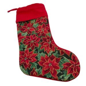 Needlepoint Christmas stocking poinsettias. They’ve been on one side.